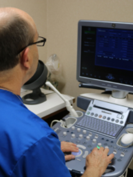 Technician Operating the Ultrasound Machine